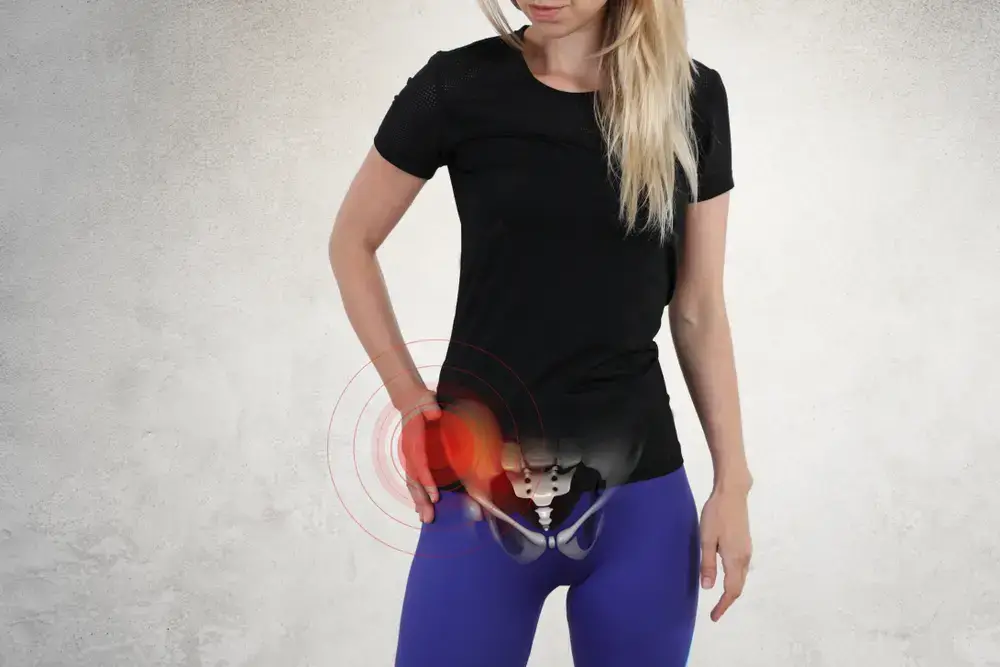 Woman with hip joint pain. Muscular Problems